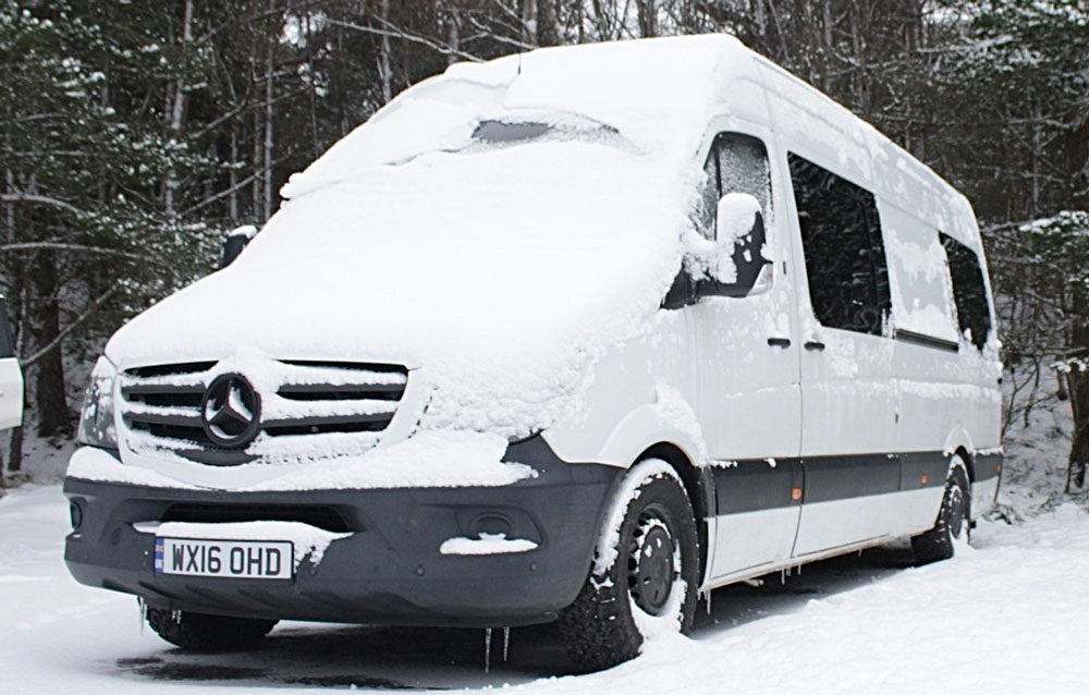 Campervan in the winter with snow